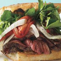 Grilled Steak Sandwiches with Marinated Watercress, Onion, and Tomato Salad_image