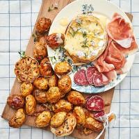 Baked cheese with roasted garlic Jersey Royals_image