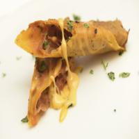 Cheesy Pulled Pork Taquitos image