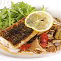 Pan-Roasted Striped Bass with Roasted Artichokes, Mushrooms, and Tomato Marmalade image
