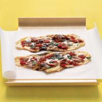 Grilled-Tomato Pizzettes With Basil and Fontina Cheese image