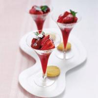 Strawberries in rosé wine image