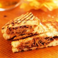 Grilled Cheese with Pulled Short Ribs and Pickled Red Onions image