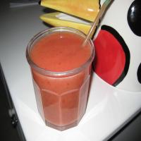 Thick Tropical Smoothie With Bananas and Strawberries image