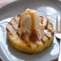 Grilled Pineapple with Vanilla Ice Cream And Rum Sauce image
