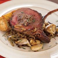 Rack of Venison Stuffed with Pecans, Currants, Sausage, and Pears image
