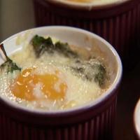 Baked Eggs with Canadian Bacon, Spinach, and Aged Cheddar image