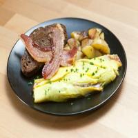 Mushroom, Tomato and Onion Omelet with Home Fries and Bacon image