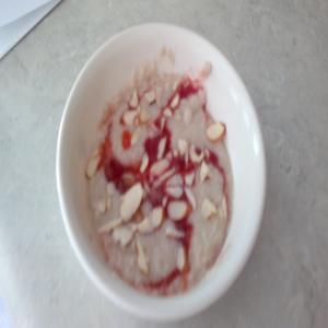 Oatmeal With Almonds and Strawberry Star Anise Sauce_image