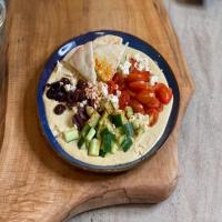 Loaded Hummus Bowl with Feta, Tomatoes and Cucumbers_image