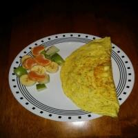 Eggs and Sausage Omelet With Tomatoes and Peppers image