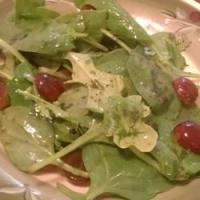 Arugula and Romaine Salad with Red Grapes image