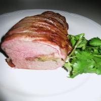 Bacon Wrapped Beef Tenderloin With Herb Stuffing_image