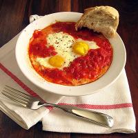 Baked Eggs In Tomato Sauce with Ricotta Cheese Recipe - (4.1/5)_image