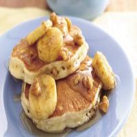 Oatmeal-Brown Sugar Pancakes with Banana-Walnut Syrup image
