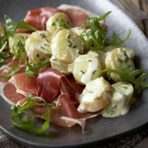 Warm new potatoes with cured ham & chives_image