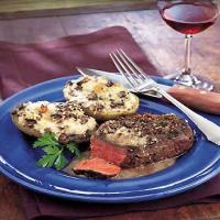 Peppercorn Steaks with Bourbon Sauce image