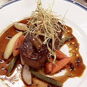 Tournedos Rossini-style with Glazed Vegetable Bouquetiere, Sauce Perigueux-style image