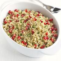Herby couscous with citrus & pomegranate dressing image