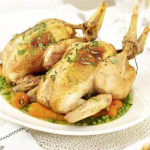 Mustard-buttered chicken with tarragon, peas & carrots image