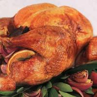 Roast Turkey with Oranges, Bay Leaves, Red Onions, and Pan Gravy image