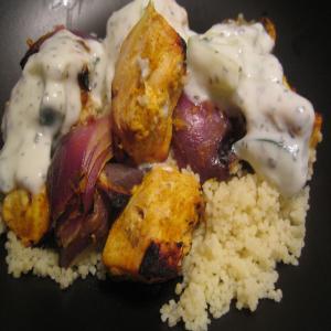 Grilled Tandoori Chicken and Red Onion Skewers With Couscous image