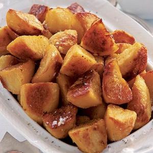 Golden spiced roast potatoes image