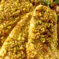 Pistachio-Crusted Tilapia with Chard, Flash-Fried Prosciutto, Gorgonzola and Pine Nuts image