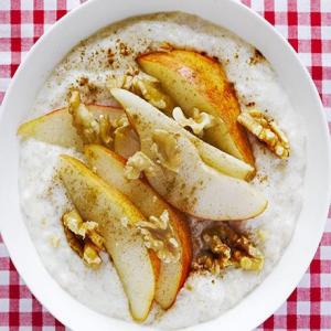 Creamy yogurt porridge with pear, walnut & cinnamon topping image