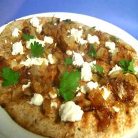 Grilled Pitas With Caramelized Onions and Goat Cheese image