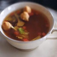Tomato and Celery-Infused Beef Consommé with Tiny Choux Puffs image