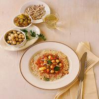 Couscous with Spiced Red Sauce, Chickpeas, and Almonds_image
