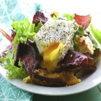 Savory Parmesan Pain Perdu With Poached Eggs and Greens image