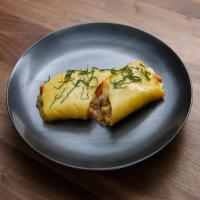 Omelet with Prosciutto, Roasted Peppers, Fresh Mozzarella, Basil image