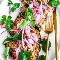 Sausage and Cheese-Stuffed Poblano Peppers with Quick-Pickled Red Onions and Radishes image
