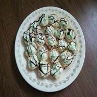 Pistachio Pudding Tarts With Chocolate Drizzle image