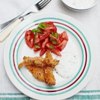 Crunchy chicken pieces with a herby yoghurt dip_image