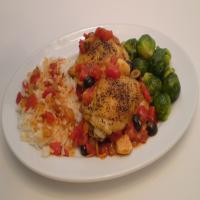 Chicken thighs with olives and basil_image