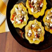Roasted Acorn Squash with Mushrooms, Peppers and Goat Cheese image