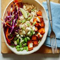 Healthy Tuna Grain Bowl with Turmeric Sweet Potatoes and Spicy Yogurt Dressing image