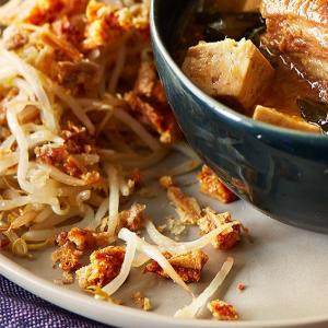 Warm salad of beansprouts with pork crackling image