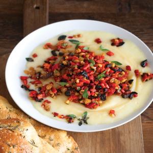 Warm Robiola Cheese with Pine Nuts, Olives, and Golden Raisins_image