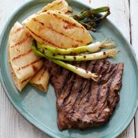 Korean-Style Marinated Skirt Steak with Grilled Scallions and Warm Tortillas image