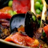 Paella With Wild Rice, Seafood and Cornish Hen image