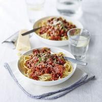 Spaghetti Bolognese with salami & basil image