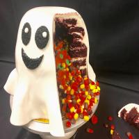 Ghost-Busted Piñata Cake image