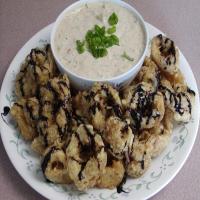 Fried Calamari With Remoulade Sauce Drizzled With Balsamic Syrup image