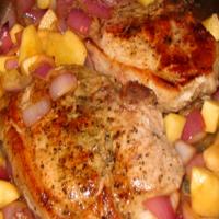 Pork Chops With Apples, Onions and Cheesy Baked Potatoes image