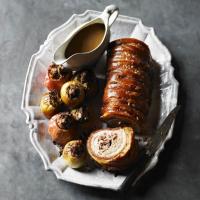 Crackle roast pork with sausage-stuffed apples & onions image
