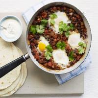 Chipotle bean chilli with baked eggs image